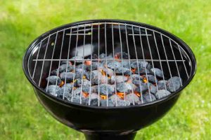 charcoal grill with briquettes vs. gas grill
